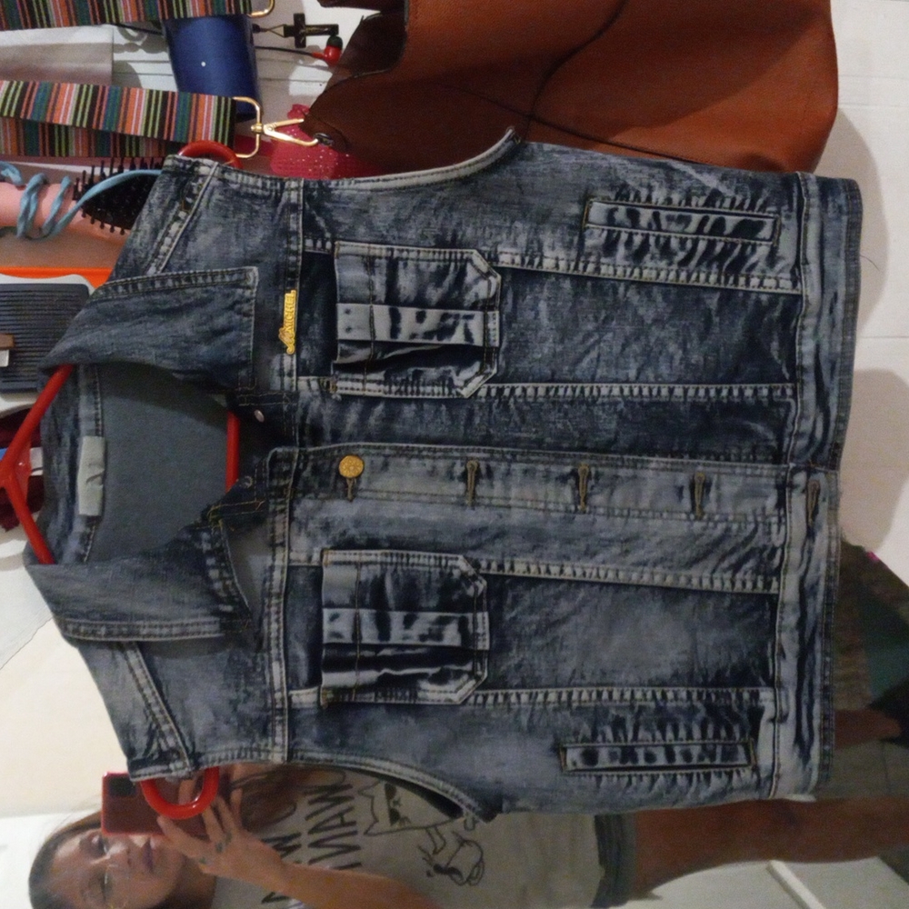 The brand is M.Michel size xl